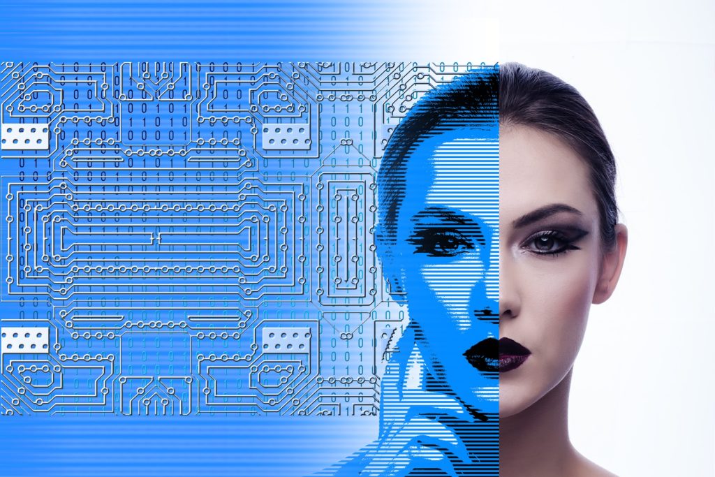 Rosto de mulher que se transforma em digital a partir da metade direita da face, para representar o conceito de gêmeos digitais.